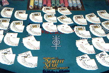 Blackjack table with faned cards